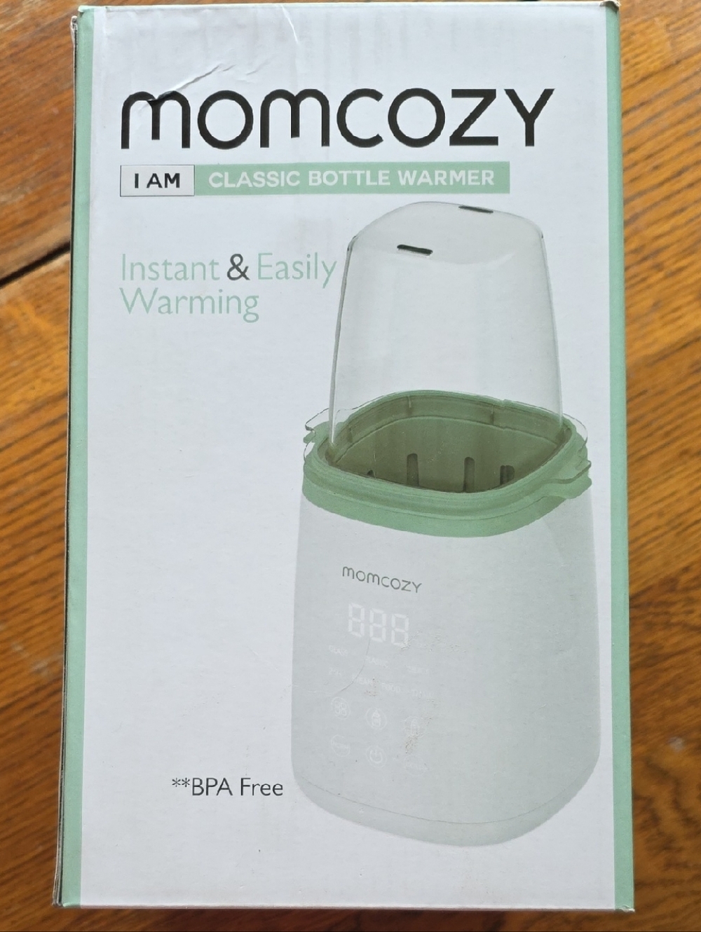 EUC Momcozy Classic Bottle Warmer in Mint Green for formula or breastfeeding